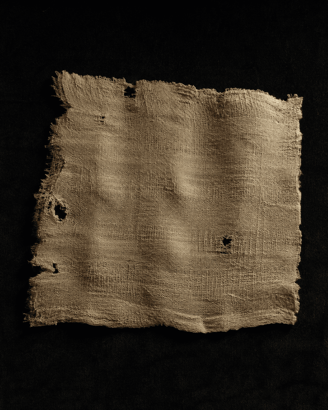 Ancient linen fragment still life